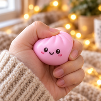 Squishy dumpling anti-stress pressé dans la main