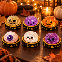 Les 6 squishys Halloween pailletés dans leurs boîtiers
