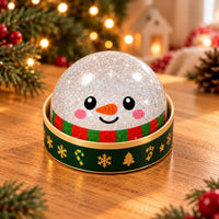 Squishy dumpling de Noël bonhomme de neige pailleté dans sa petite boîte