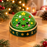Squishy dumpling de Noël sapin pailleté dans sa petite boîte